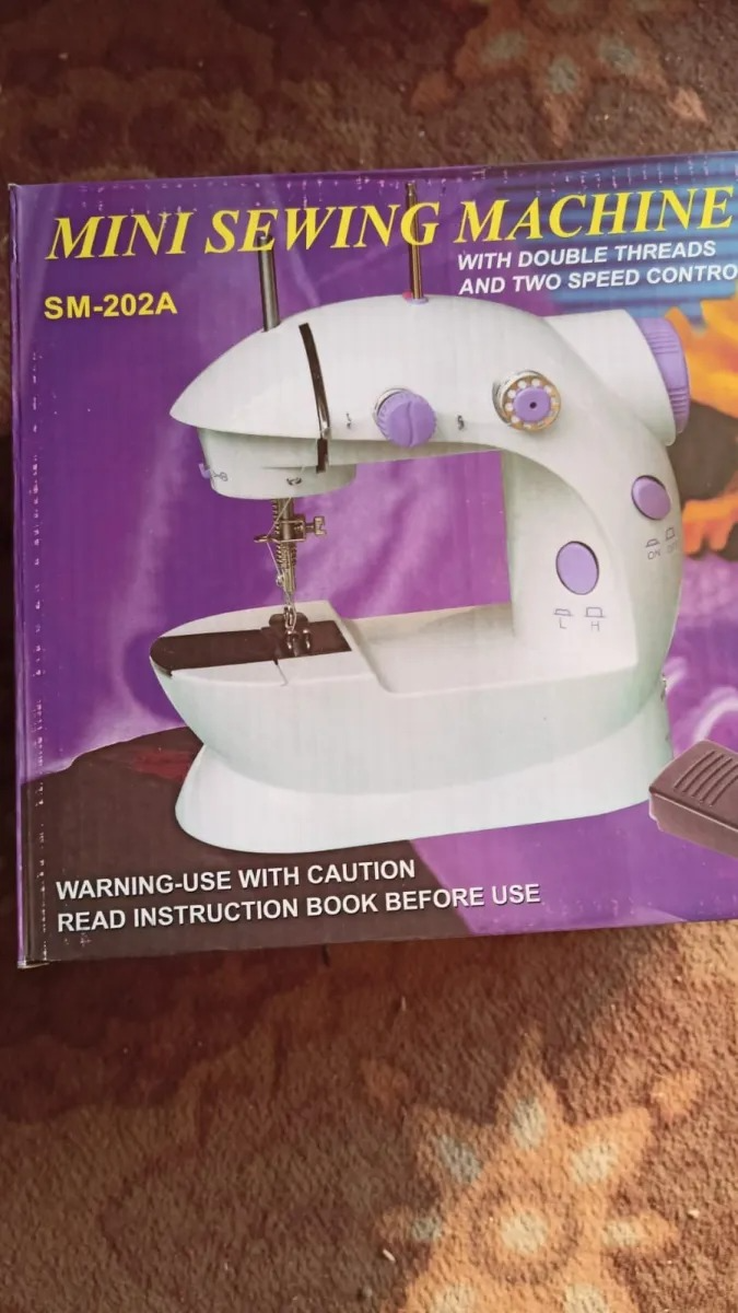 SM-202A Mini Electric Sewing Machine